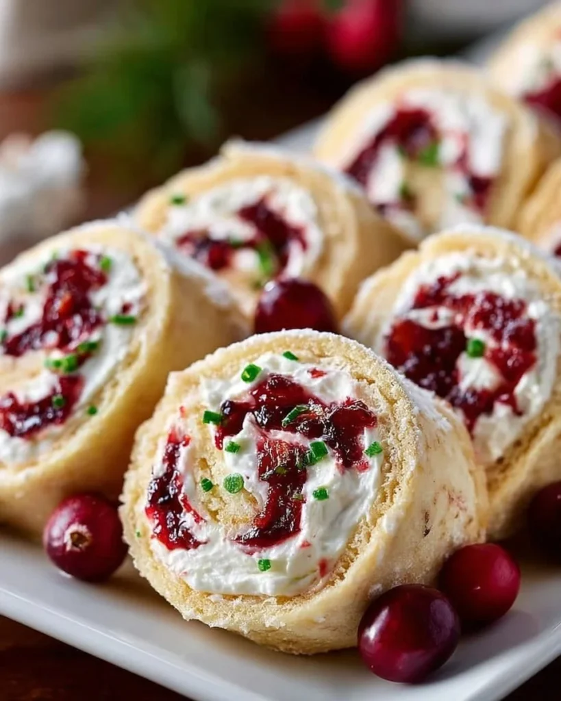 Festive Christmas Cranberry Roll Ups with cream cheese and cranberries