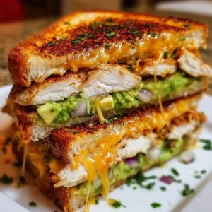Delicious Chicken Avocado Melt Sandwich with avocado, chicken, and melted cheese.
