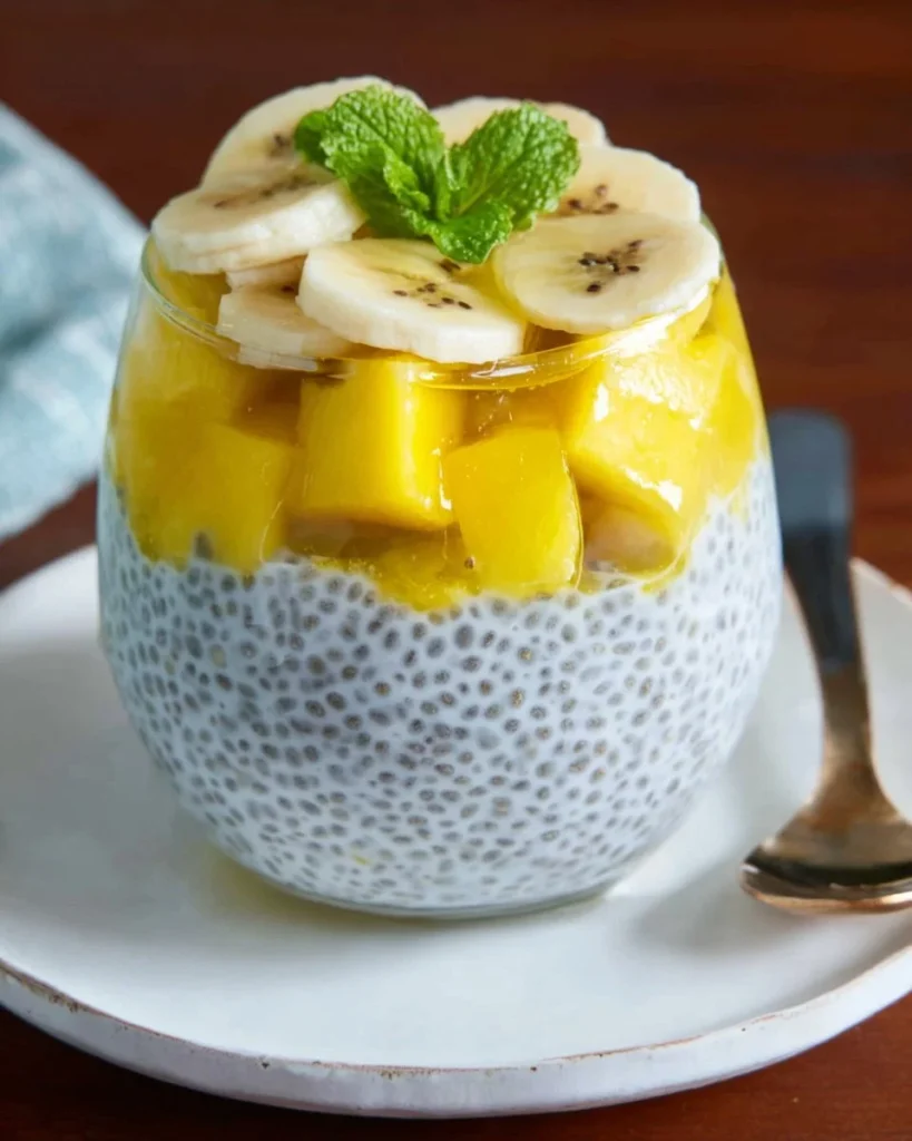 A vibrant bowl of Tropical Chia Pudding Delight topped with fresh fruits