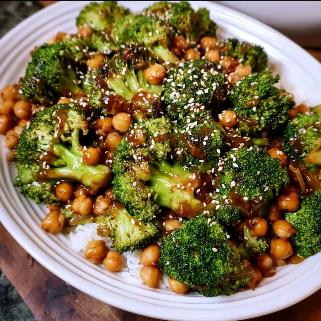 Delicious broccoli stir fry with chickpeas garnished with sesame seeds.