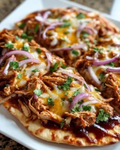 BBQ Chicken Flatbread topped with fresh ingredients and barbecue sauce