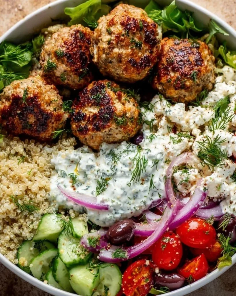 Delicious Greek Turkey Meatball Bowls with fresh ingredients and vibrant flavors.