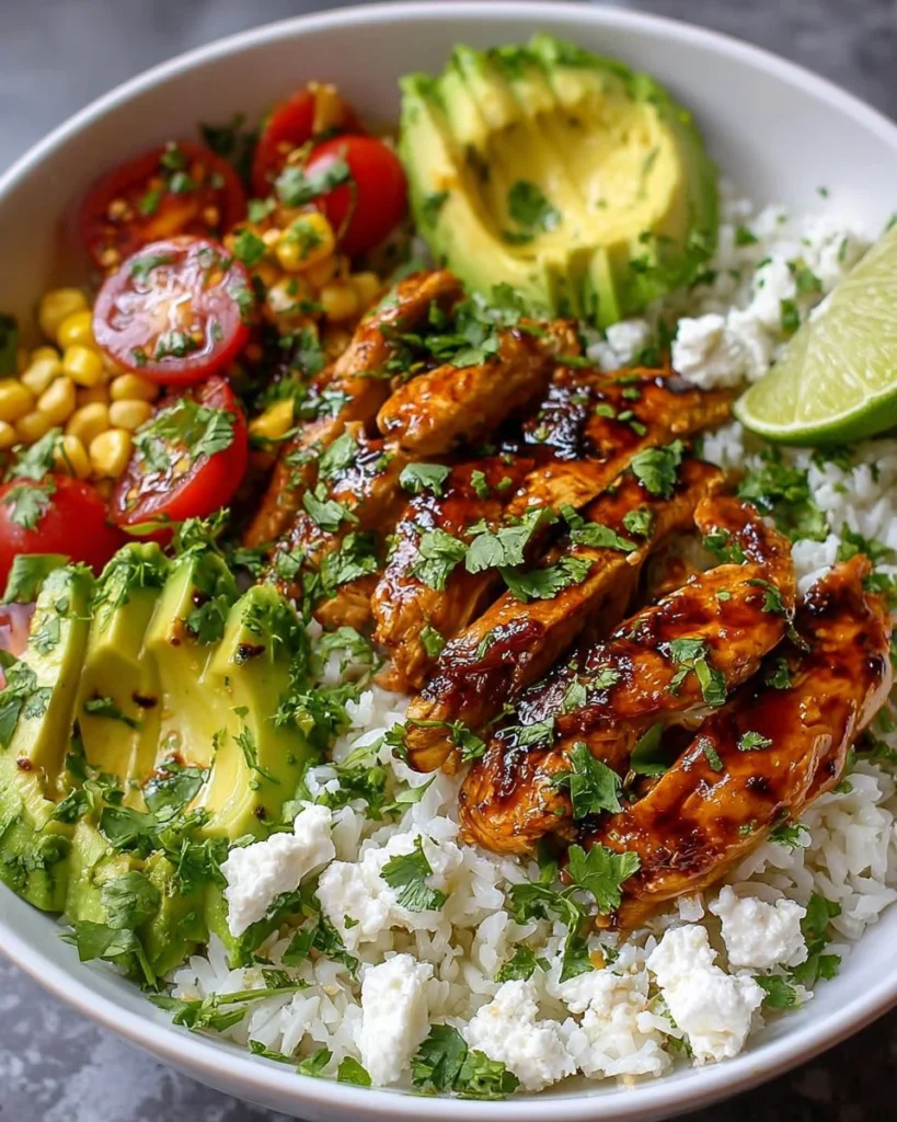 Delicious Honey Lime Chicken served in an Avocado Rice Bowl.