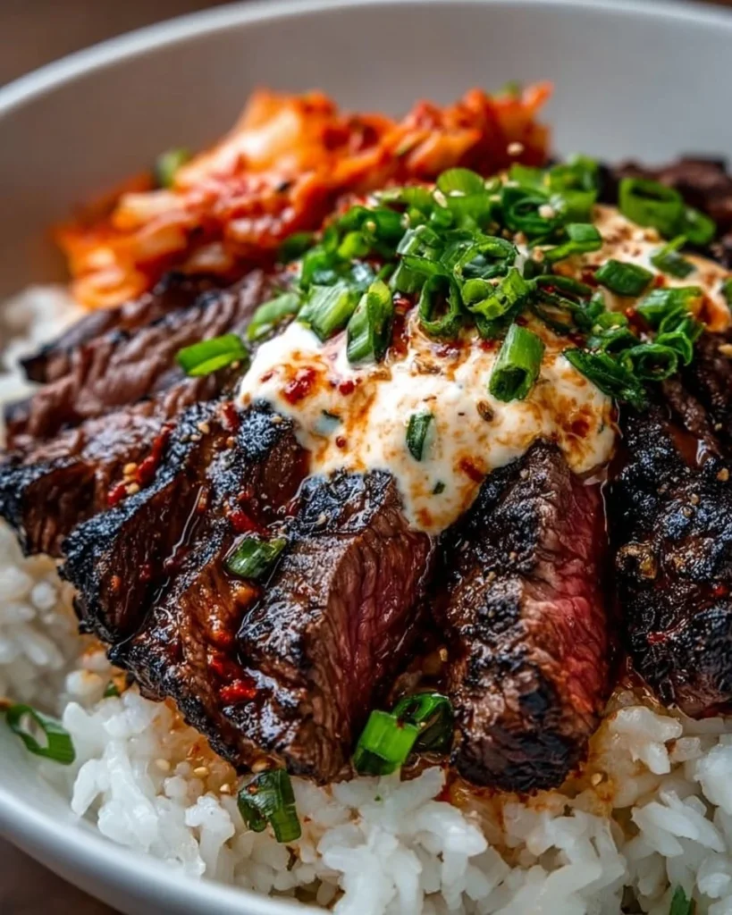 Korean BBQ Steak Rice Bowl with grilled steak, rice, and vegetables