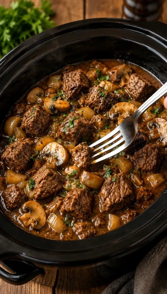 Slow cooked beef tips with mushrooms in a bowl